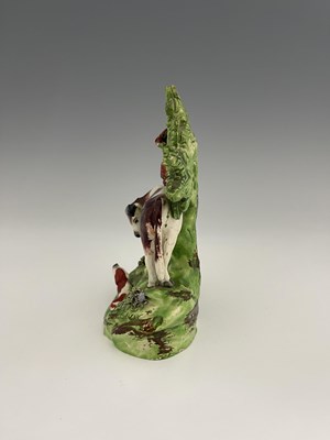 Lot 1042 - A Staffordshire boccage figure of a cow and...