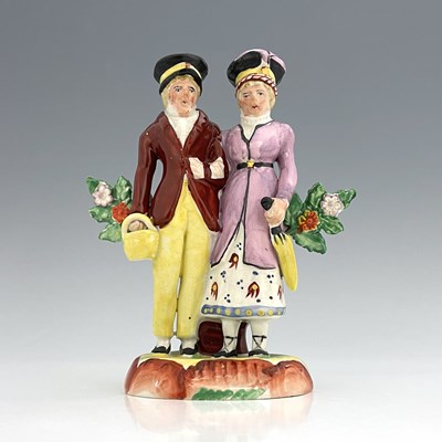 Lot 1077 - A Staffordshire pearlware figure group of the...