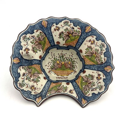 Lot 790 - A French Faience shaving shaving bowl, ogee...