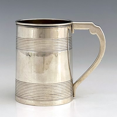 Lot 17 - A George III silver mug, of cylindrical form,...
