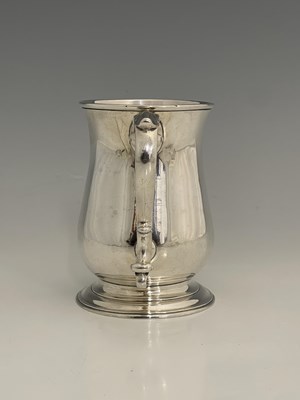 Lot 18 - A George III silver mug, of baluster form, the...