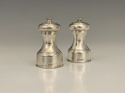 Lot 19 - A pair of Elizabeth II silver-mounted pepper...