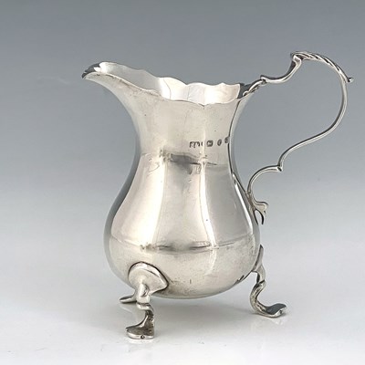 Lot 21 - A Victorian silver cream jug, modelled in the...
