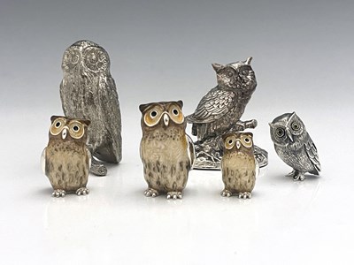 Lot 69 - Six silver-coloured metal figures of owls, to...