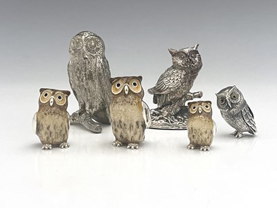 Lot 69 - Six silver-coloured metal figures of owls, to...