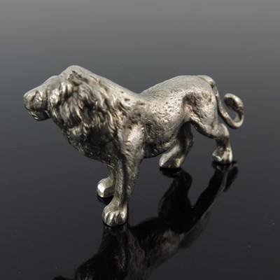 Lot 70 - An Edwardian silver novelty figure of a lion,...