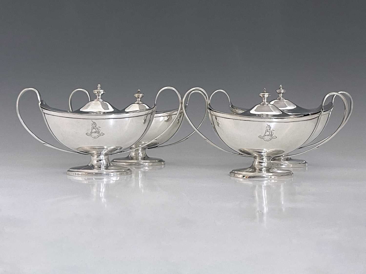 Lot 74 - A set of four George III neoclassical silver...