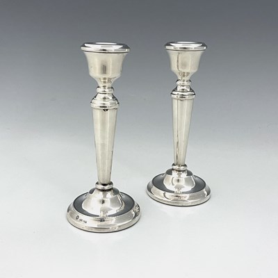 Lot 277 - A pair of Elizabeth II silver weighted library...