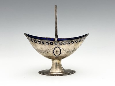 Lot 187 - A George III neoclassical silver swing handle...