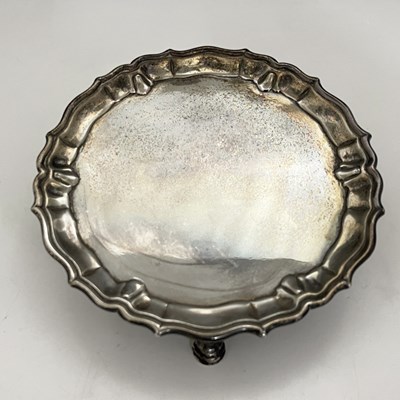 Lot 127 - A George II silver waiter, of circular form...