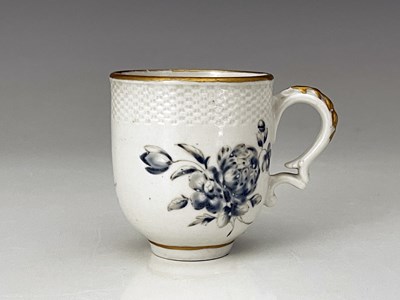 Lot 717 - A Bristol porcelain coffee cup, cross mark,...