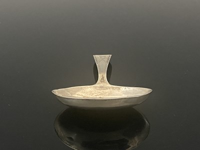 Lot 130 - A George III silver tea caddy spoon, with oval...
