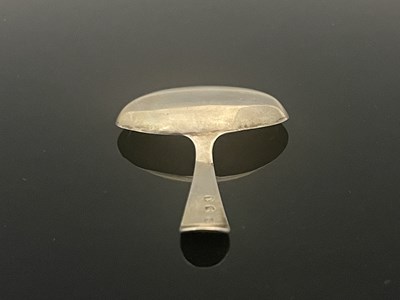 Lot 130 - A George III silver tea caddy spoon, with oval...