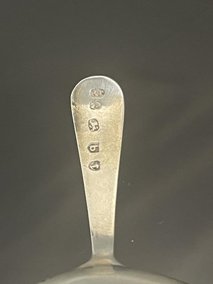 Lot 130 - A George III silver tea caddy spoon, with oval...
