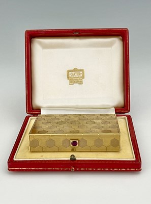 Lot 87 - Cartier. An 18ct gold box, of rectangular form,...