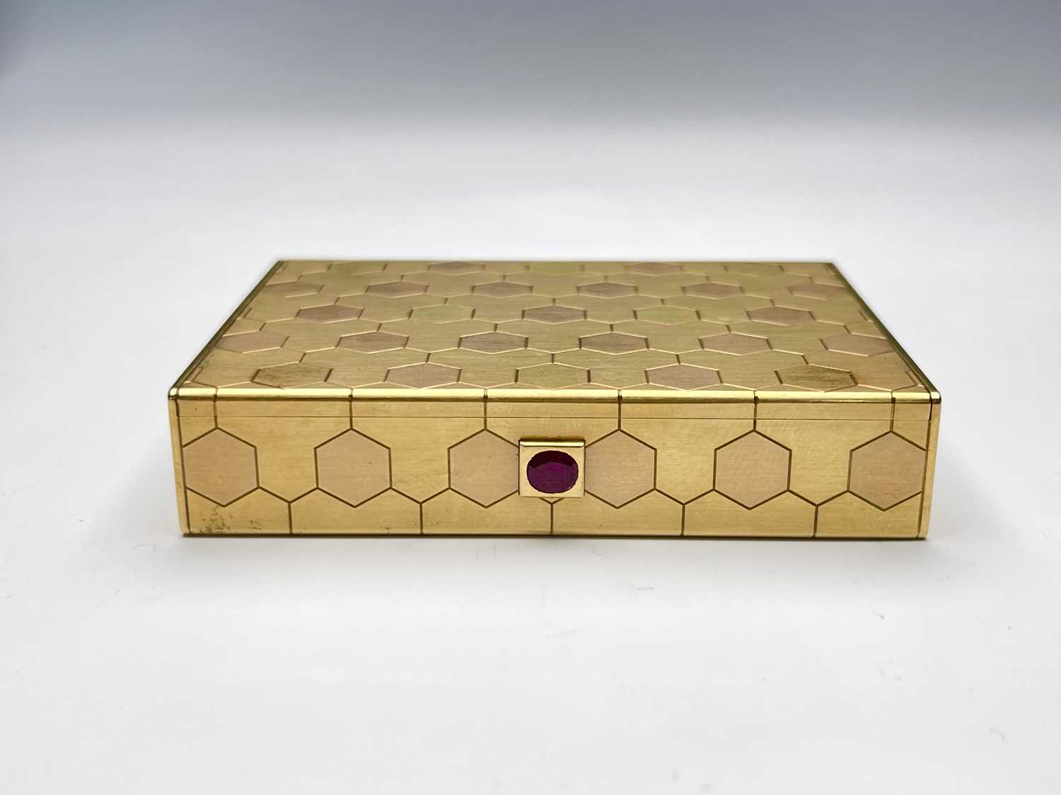 Lot 87 - Cartier. An 18ct gold box, of rectangular form,...