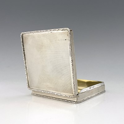 Lot 23 - An Elizabeth II silver box, of squat cuboid...