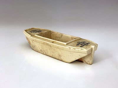 Lot 642 - A Doulton Lambeth advertising novelty tug boat,...