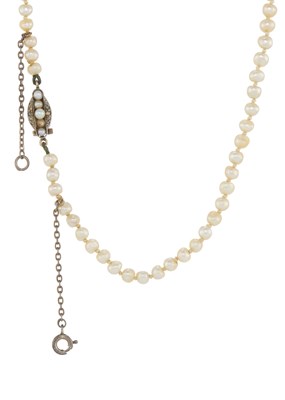 Lot 16 - An early 20th century natural pearl necklace, with diamond clasp
