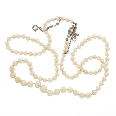 Lot 16 - An early 20th century natural pearl necklace, with diamond clasp