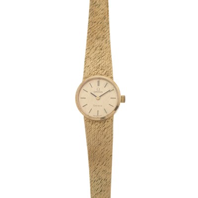 Lot 226 - Omega, a 9ct gold Geneve bracelet watch