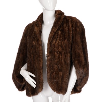 Lot 475 - A ranch mink cape shrug, featuring a short...