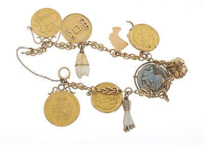 Lot 108 - A gold charm bracelet