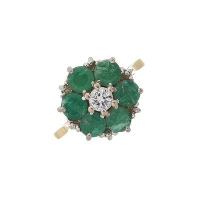 Lot 158 - An 18ct gold emerald and diamond cluster ring