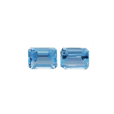 Lot 54 - A pair of loose rectangular-shape aquamarines