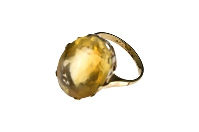 Lot 25 - A 9 carat gold citrine single stone ring,...