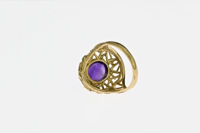 Lot 60 - A Modernist 9 carat gold and amethyst cabochon...