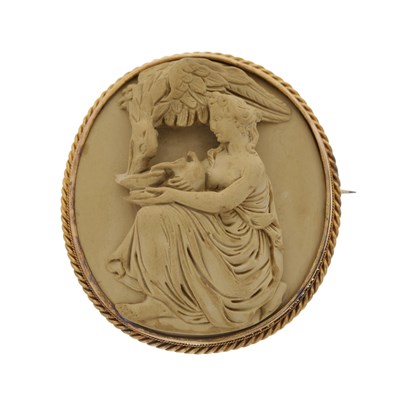 Lot 121 - A late 19th century gold lava cameo brooch