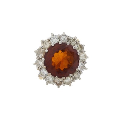 Lot 154 - An 18ct gold fire opal and diamond cluster ring