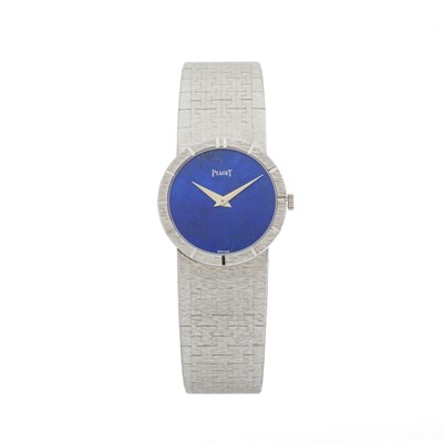 Lot 242 - Piaget, an 18ct white gold lapis lazuli bracelet watch