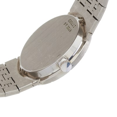 Lot 242 - Piaget, an 18ct white gold lapis lazuli bracelet watch