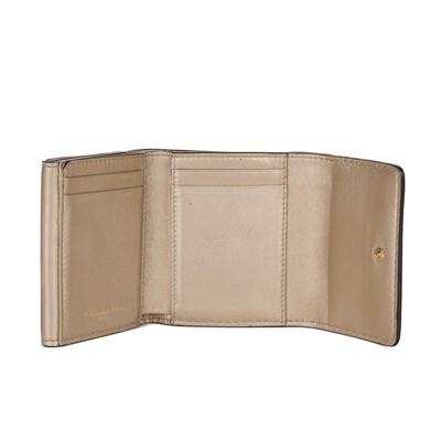 Lot 335 - Christian Dior, a D-Fence compact wallet,...