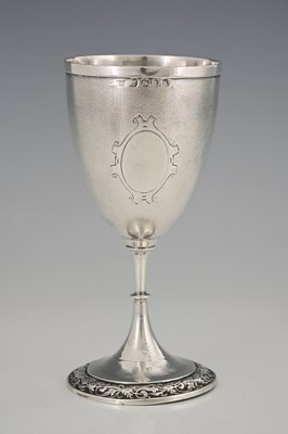 Lot 160 - A Victorian silver goblet, the body decorated...