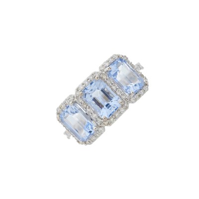 Lot 56 - An 18ct gold aquamarine and diamond dress ring