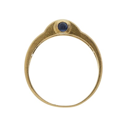 Lot 33 - An 18ct gold emerald, diamond and sapphire dress ring