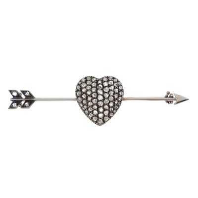 Lot 22 - A late Victorian platinum diamond heart and arrow brooch