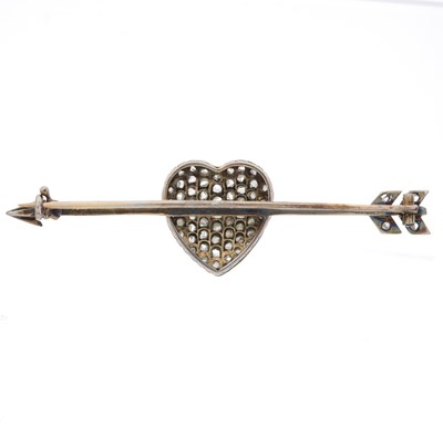 Lot 22 - A late Victorian platinum diamond heart and arrow brooch