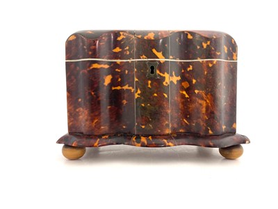 Lot 705 - A Regency tortoiseshell tea caddy, circa 1820,...