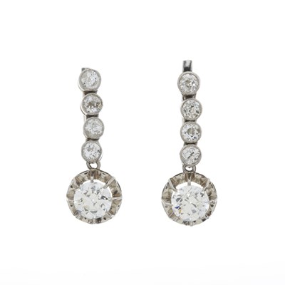 Lot 23 - A pair of early 20th century platinum old-cut diamond drop earrings