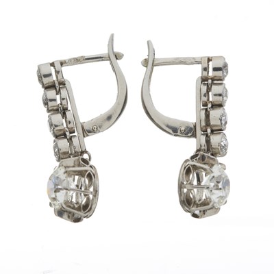 Lot 23 - A pair of early 20th century platinum old-cut diamond drop earrings