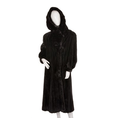 Lot 470 - A full-length black mink hooded coat,...