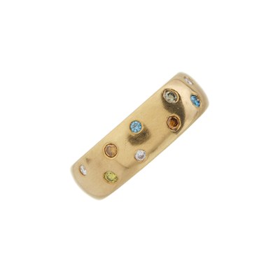 Lot 61 - An 18ct gold coloured diamond band ring