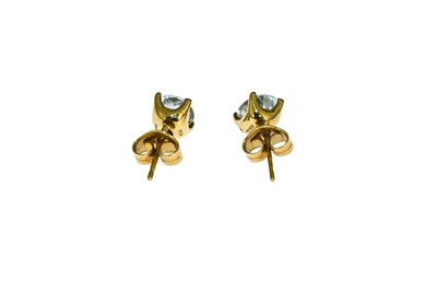 Lot 6 - A pair of 18 carat gold and blue topaz...
