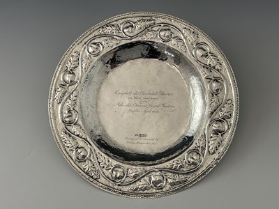 Lot 105 - An Arts and Crafts silver broad rimmed dish,...