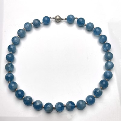 Lot 5 - An aquamarine bead necklace, with silver clasp