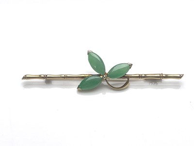 Lot 16 - A Chinese 14ct gold jade brooch, bamboo bar...